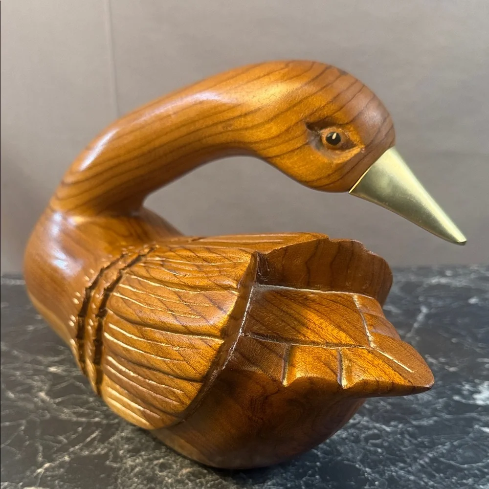 Handcrafted vintage Wooden goose decoy with brass beak